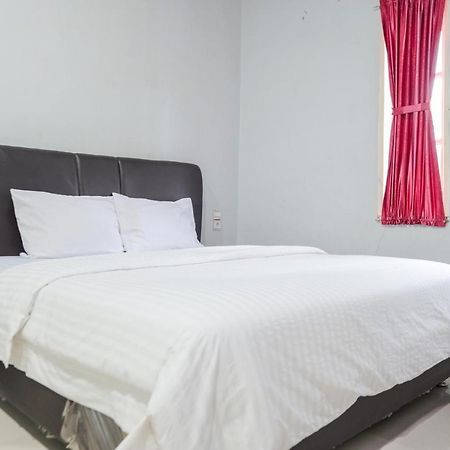 Djaboerigin Mongonsidi Guest House Redpartner Medan Eksteriør billede