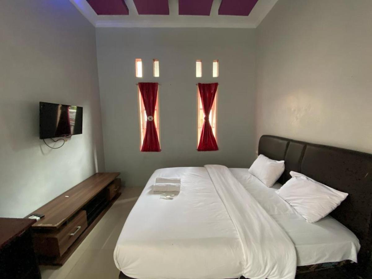 Djaboerigin Mongonsidi Guest House Redpartner Medan Eksteriør billede