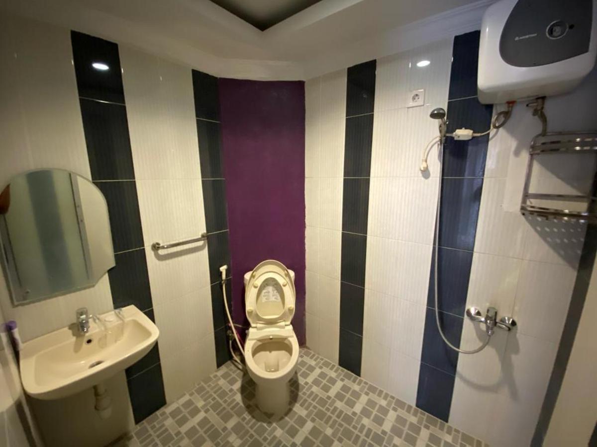 Djaboerigin Mongonsidi Guest House Redpartner Medan Eksteriør billede