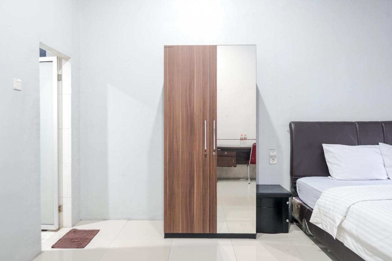 Djaboerigin Mongonsidi Guest House Redpartner Medan Eksteriør billede