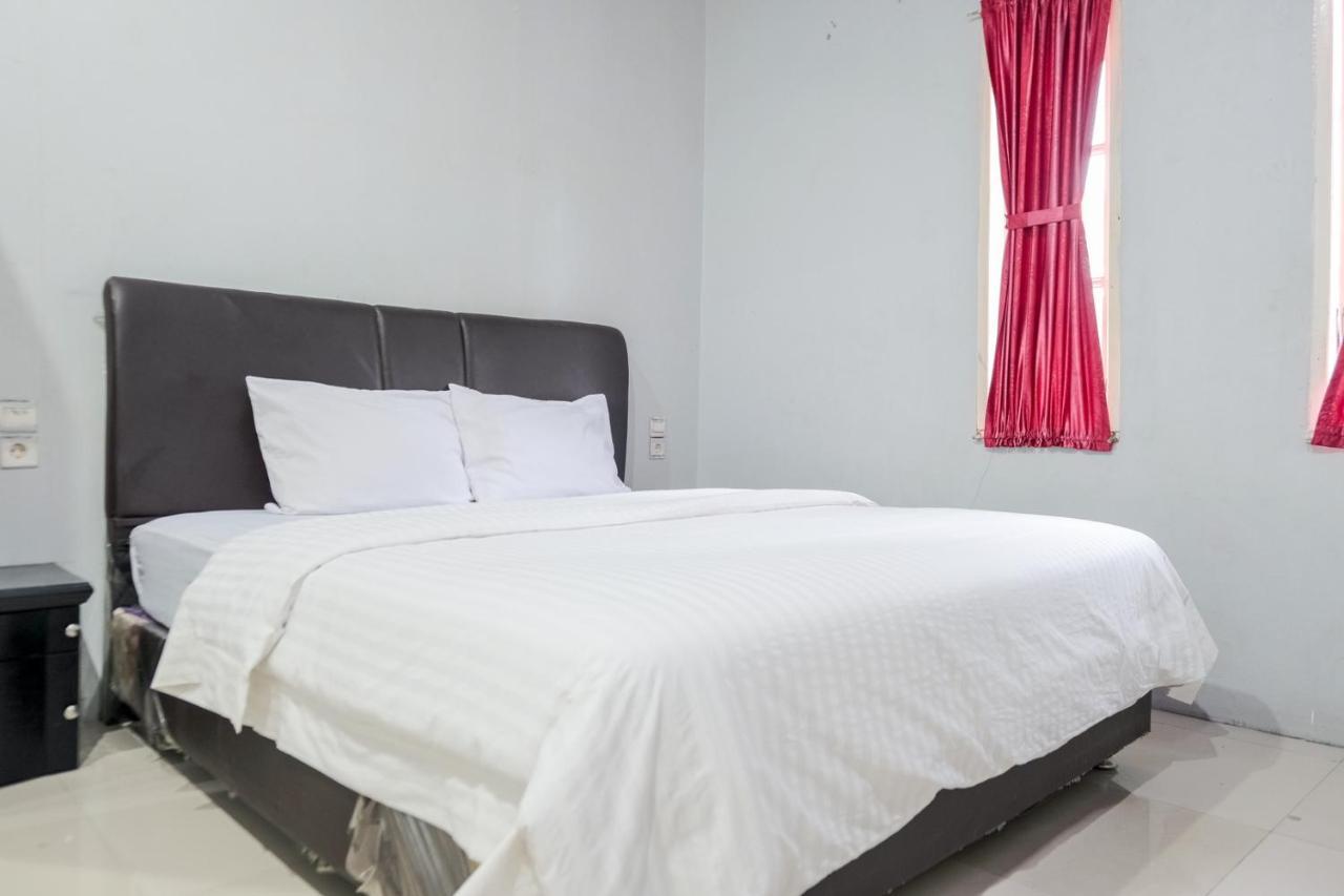 Djaboerigin Mongonsidi Guest House Redpartner Medan Eksteriør billede