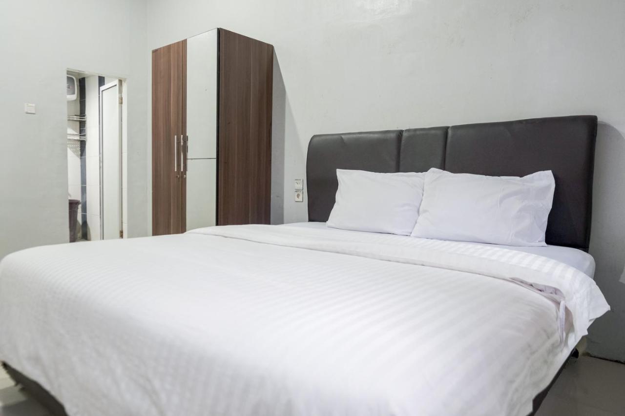 Djaboerigin Mongonsidi Guest House Redpartner Medan Eksteriør billede